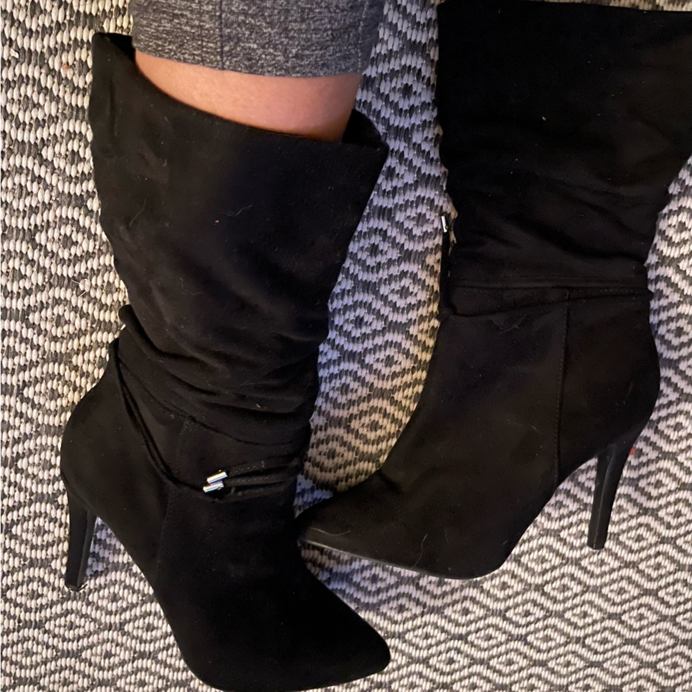 Mid calf black suede boots. inside zipper. Super cute with jeans or dress.